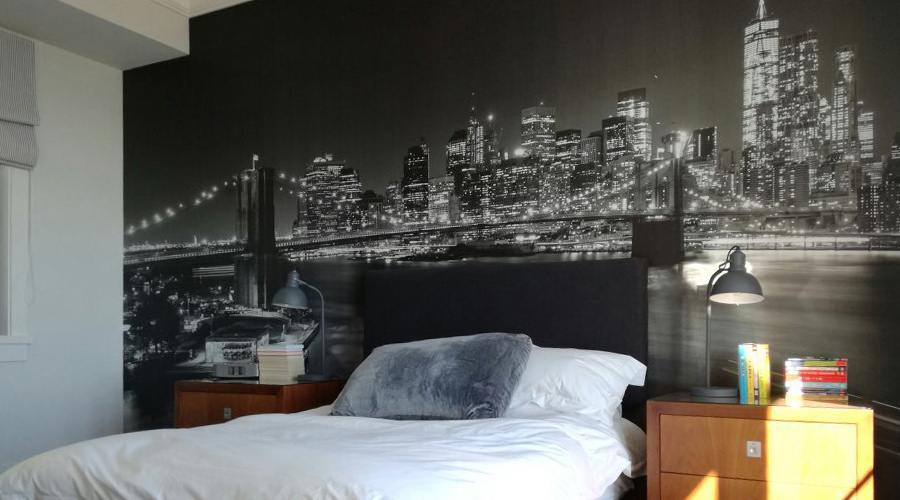 bedrom with cityscape photography