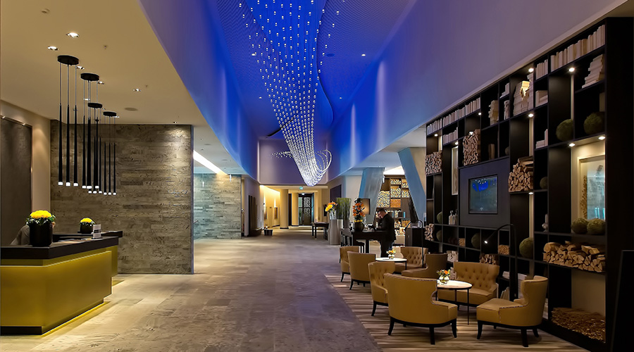 hotel lobby with regal colours and blue ceiling lights