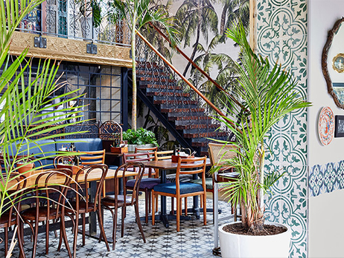 inside la parada at the v&a waterfront featuring tropical wallpaper