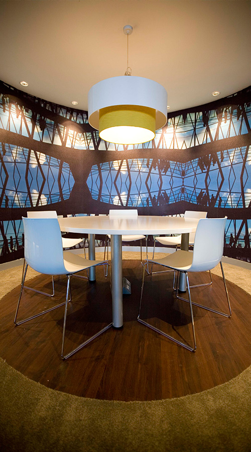 surface design using wallpaper installation in circular style office environment